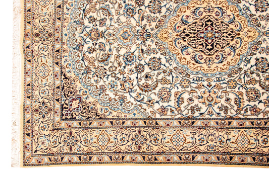 Hand knotted Nain Rug.