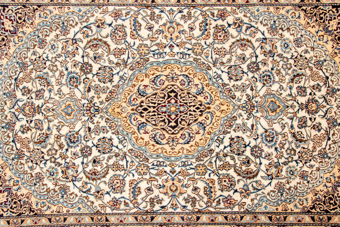 Hand knotted Nain Rug.