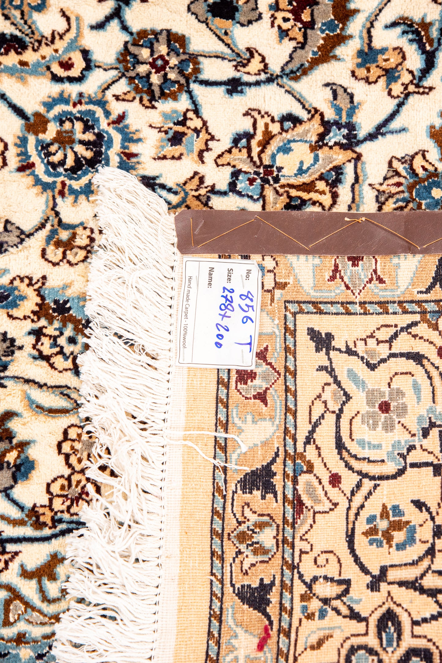 Hand knotted Nain Rug.